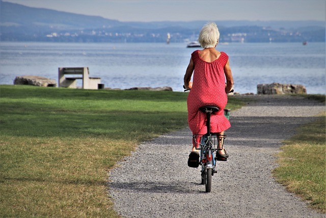 older lady on a bike